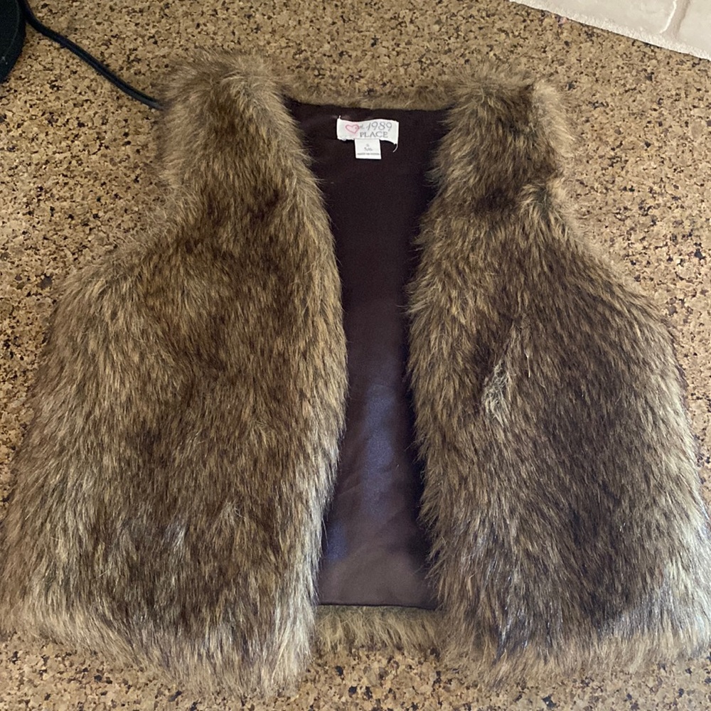 Adorable faux fur vest